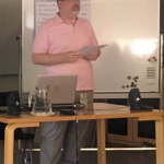 Bryce E. Rich delivering the plenary presentation